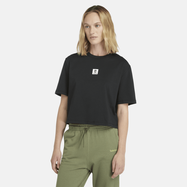 Timberland - Kurzarm-T-Shirt mit gestapeltem Logo für Damen in Schwarz
