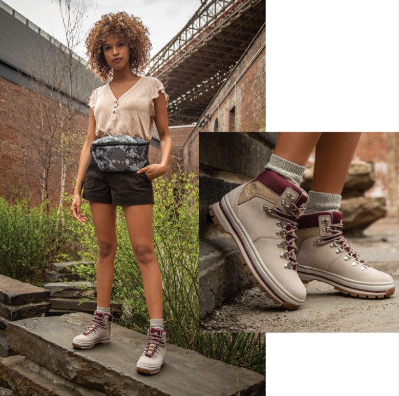 Female model in beige Timberland boots