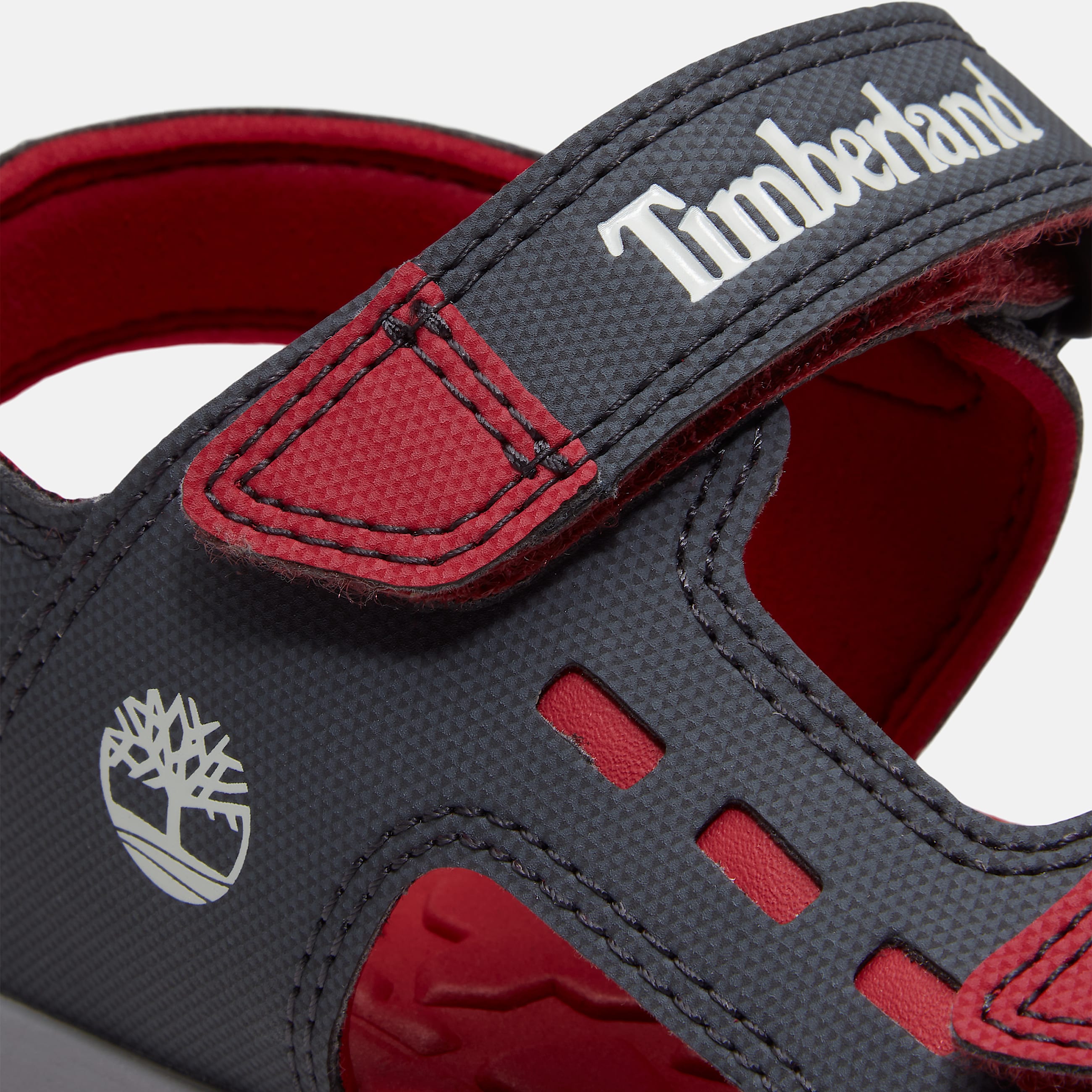 Moss Jump sandal med bagrem til unge i mrkegr TBL Gr ALT7