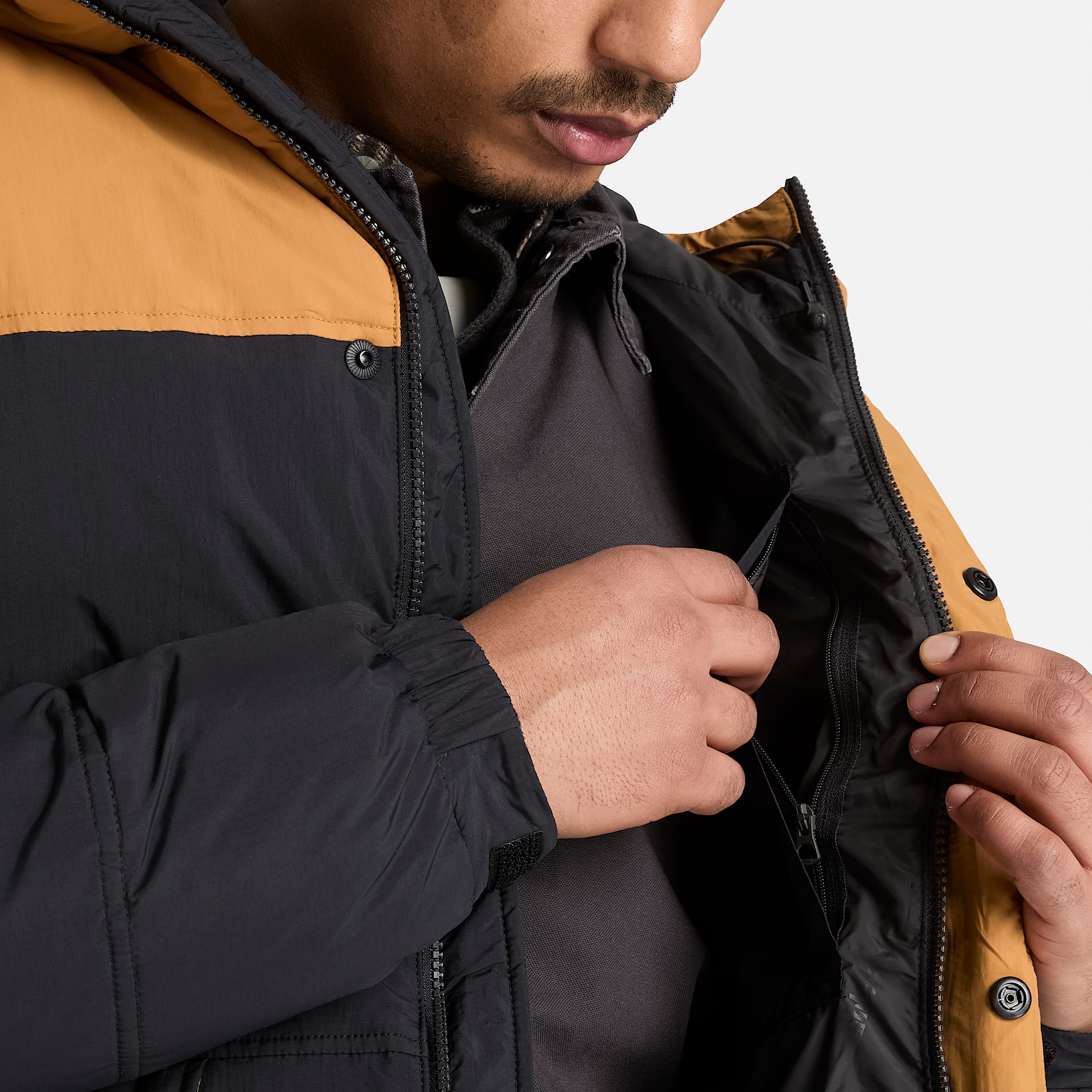 Chaqueta acolchada impermeable para hombre en Negroamarillo TBL negro ALT3