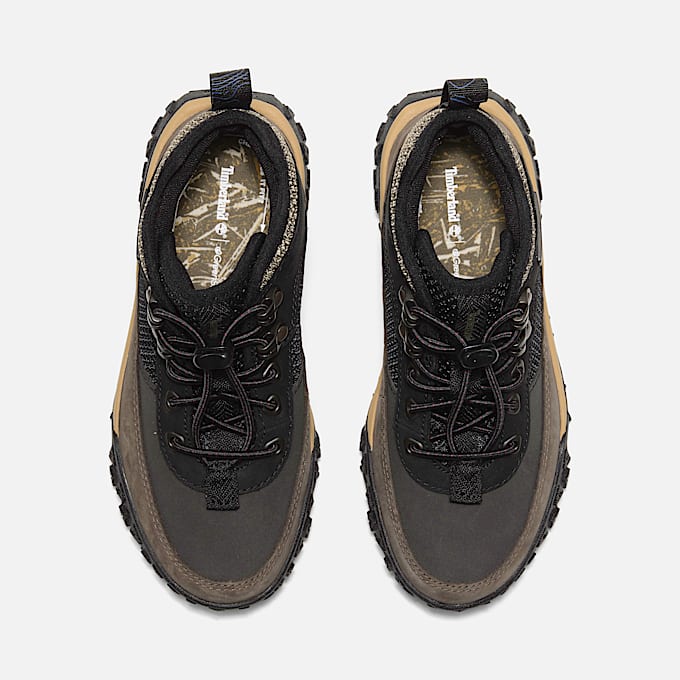 GreenStride™ Motion 6 Mid Bungee Trainer for Youth in Black/Brown