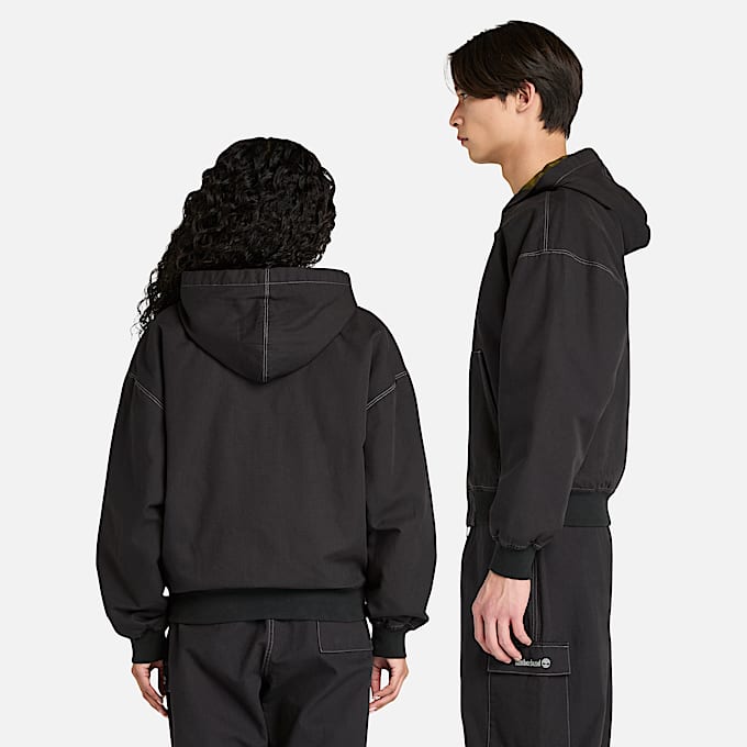 All Gender Bomberjacke aus gewaschenem Duck-Canvas mit Kapuze in Schwarz