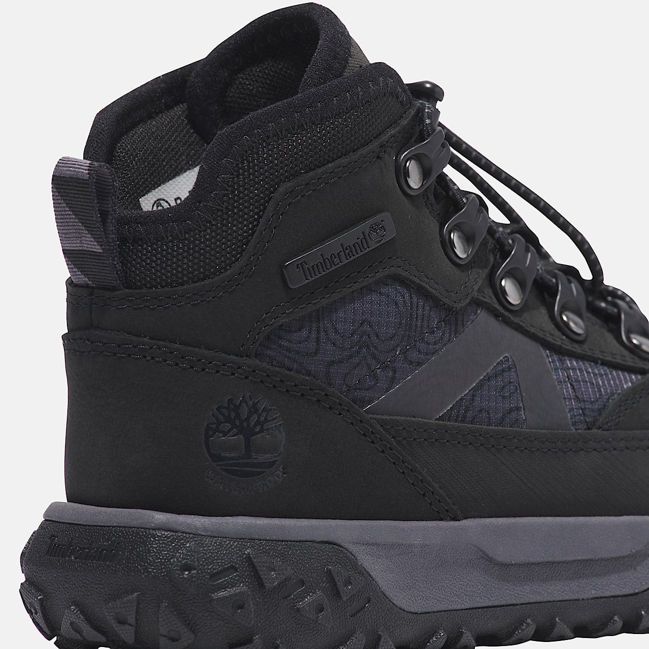 Greenstride Motion 6 Mid Bungee Waterproof Trainer for Youth in Black TBL Black ALT6