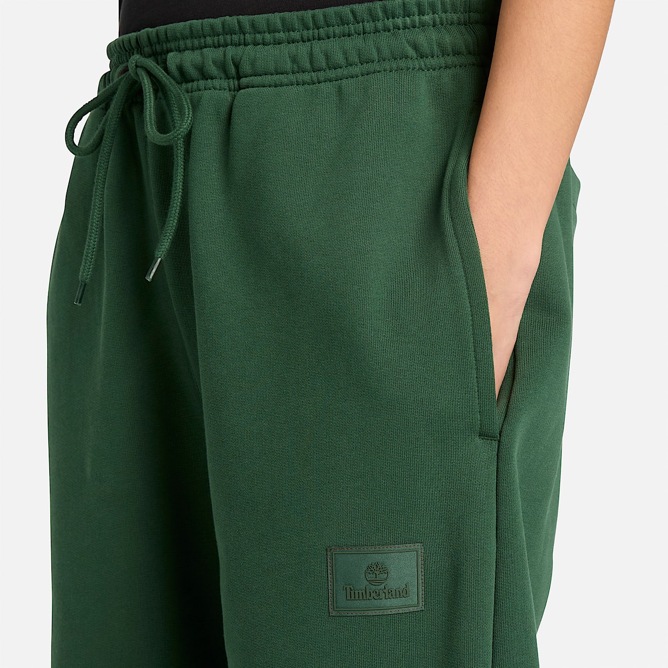 Pantalón de chándal con insignia de silicona unisex en verde oscuro - 5