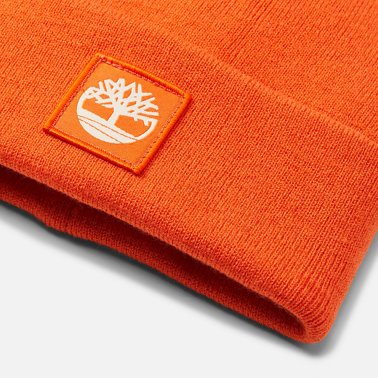 Gorro con borde vuelto con parche en contraste unisex en naranja - 2