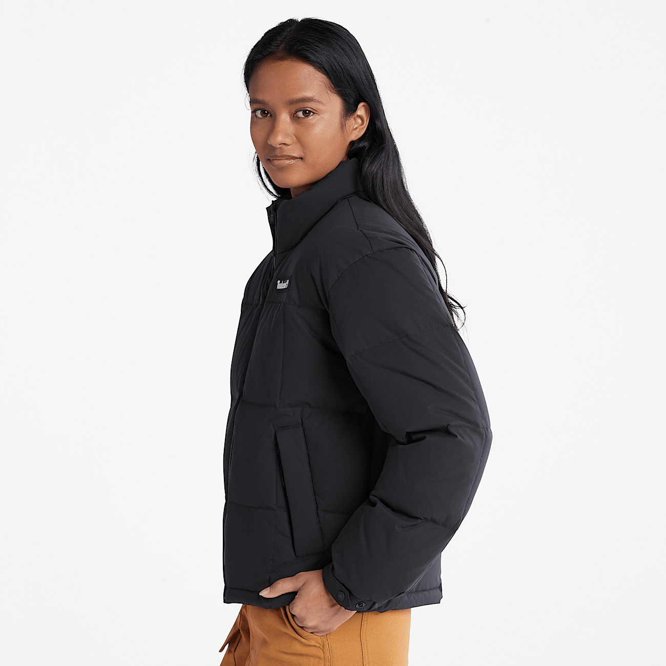 Plumon negro mujer 2025