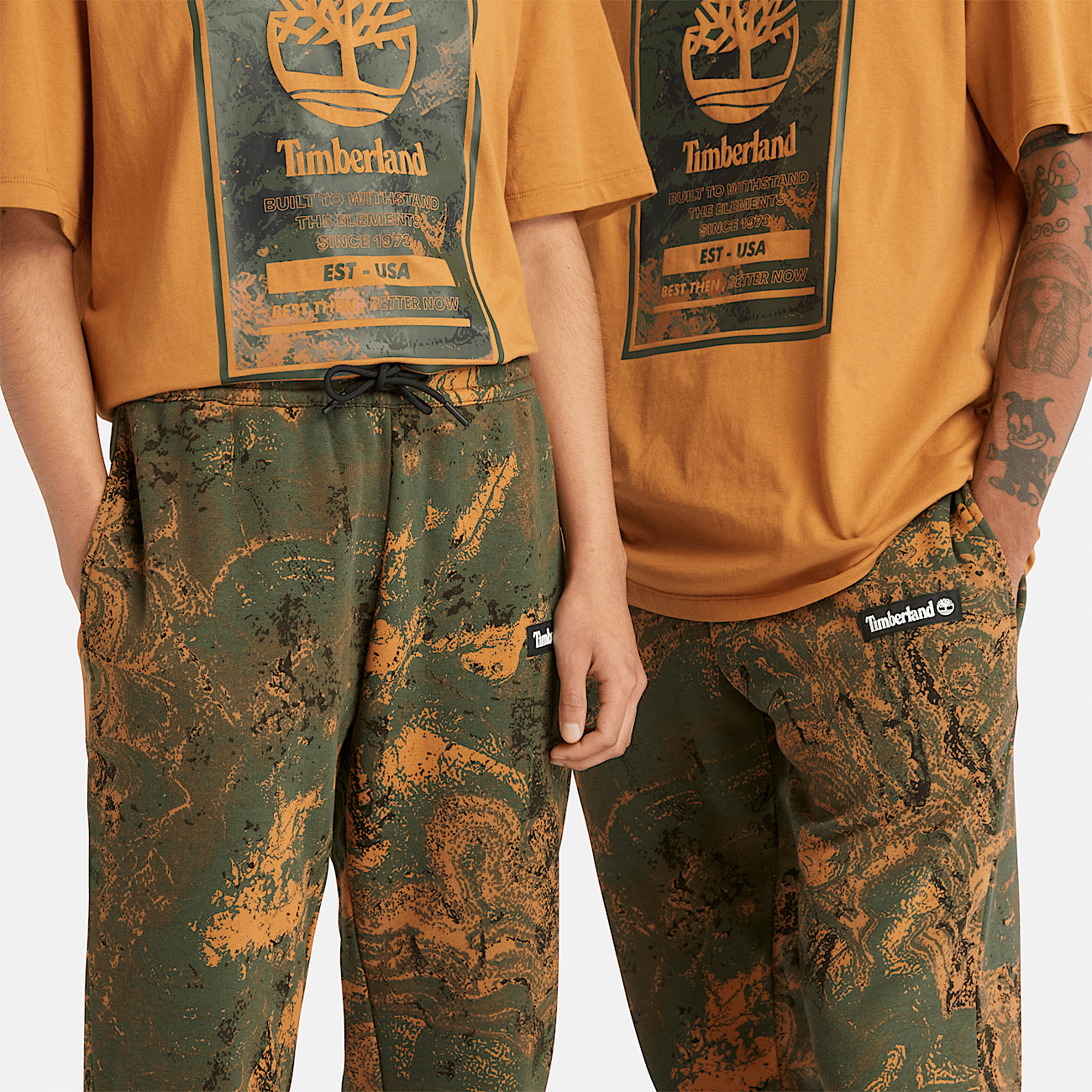 All Gender Tracksuit Bottoms in Green Orange Print