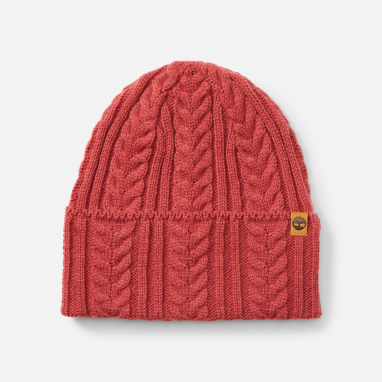 Bonnet en maille torsadee pour femme en rose