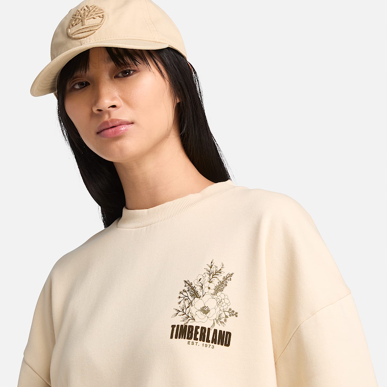 Sweat a col rond et motif brosse sur la poitrine pour femme en beige